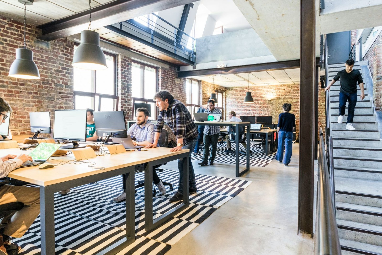 A startup team at work in an open loft office
