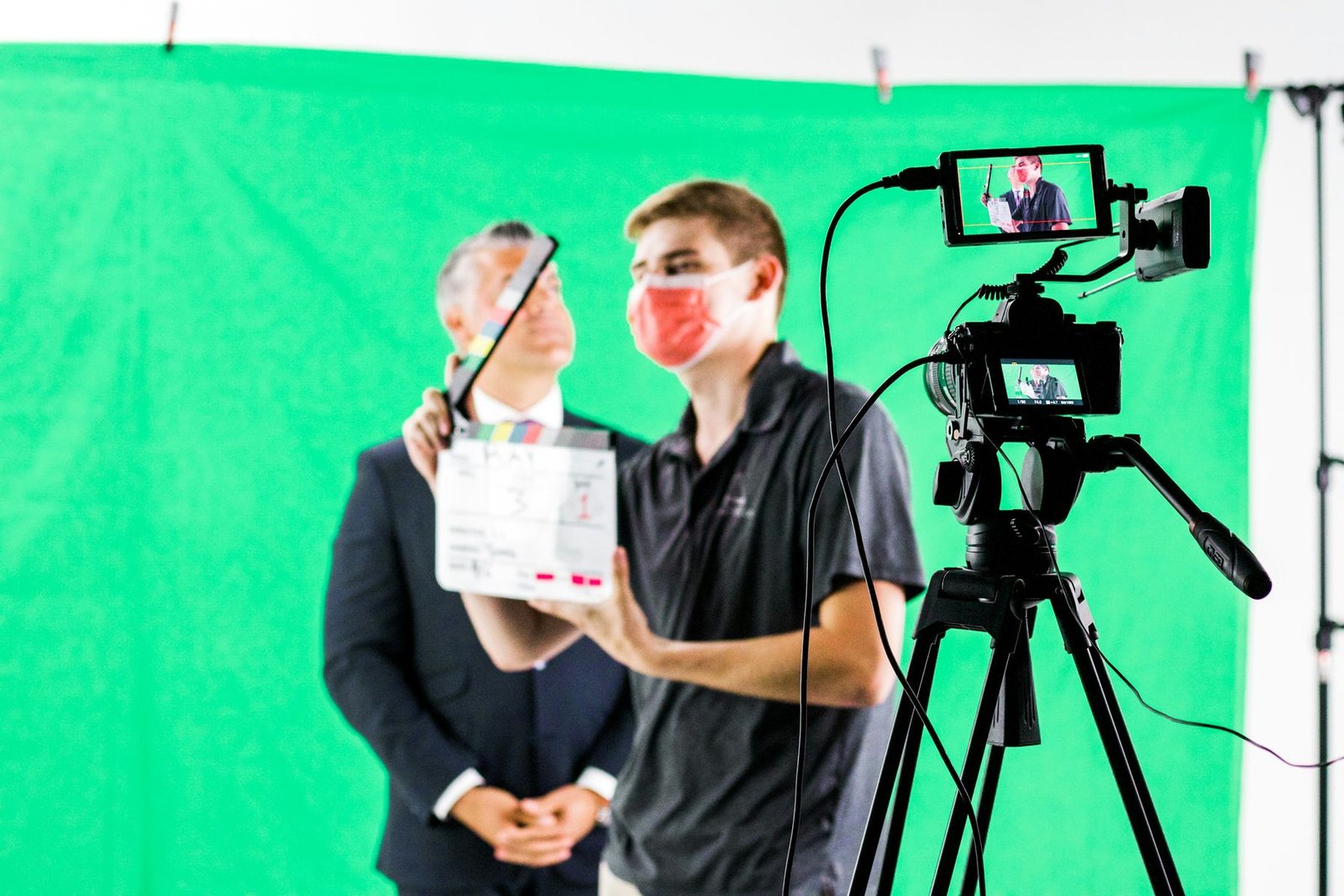 A presenter preparing to film in a studio